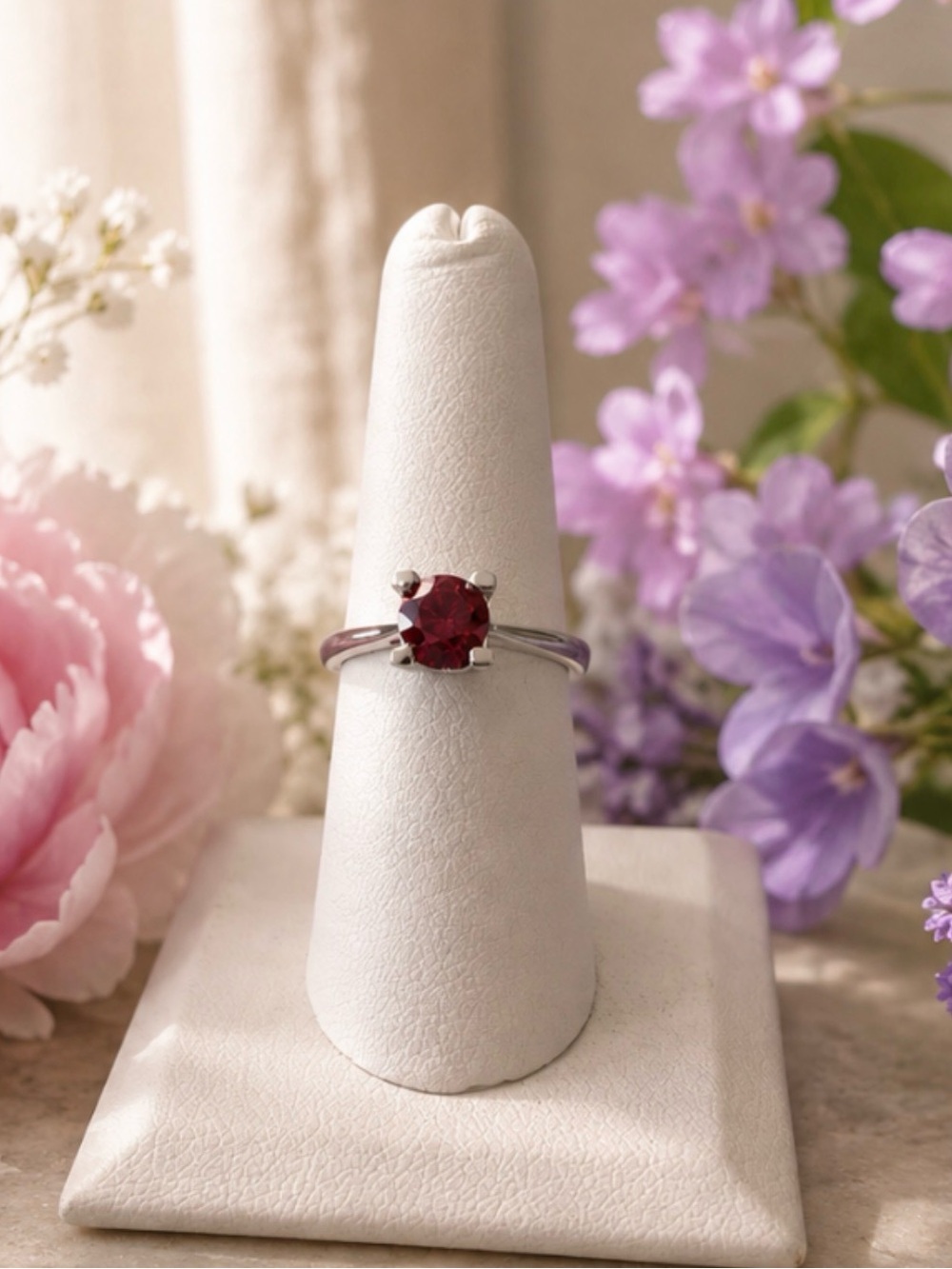 Rhodium plated red solitaire. Moissanite stone 1 ct